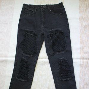 Black fishnet high rise jeans